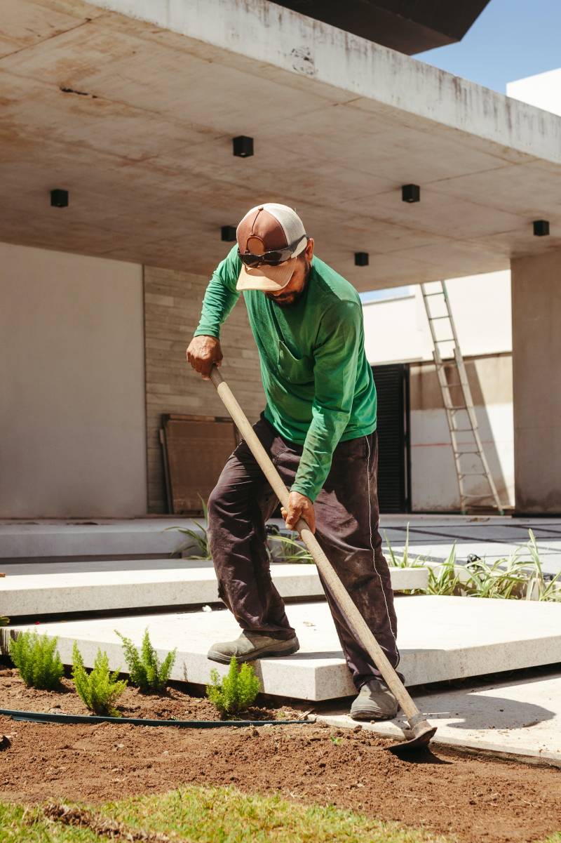 Gardener at work on site